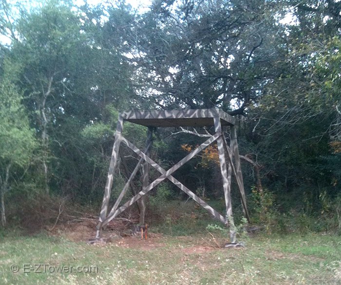 review-03.jpg - Hey Jimmy,Here are some photos of the construction and finished product for my 8ft hunting tower at my ranch in Columbus, TX. (click on the thumbnails for larger picture)I am extremely impressed with the quality, function, and appearance of this product. As you can see, our process for erecting the tower was by no means delicate or gentle but the towers took the abuse and are holding strong. With the competitors product I am almost certain we would have broken them or the platform in a similar situation. The extra price I paid was well worth it to ensure the job was done only once. I fully intend on buying at least one more pair in the future for another blind I have planned for the ranch.Thanks again,Wesley Donaldson